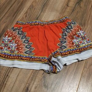 Flowy orange print shorts